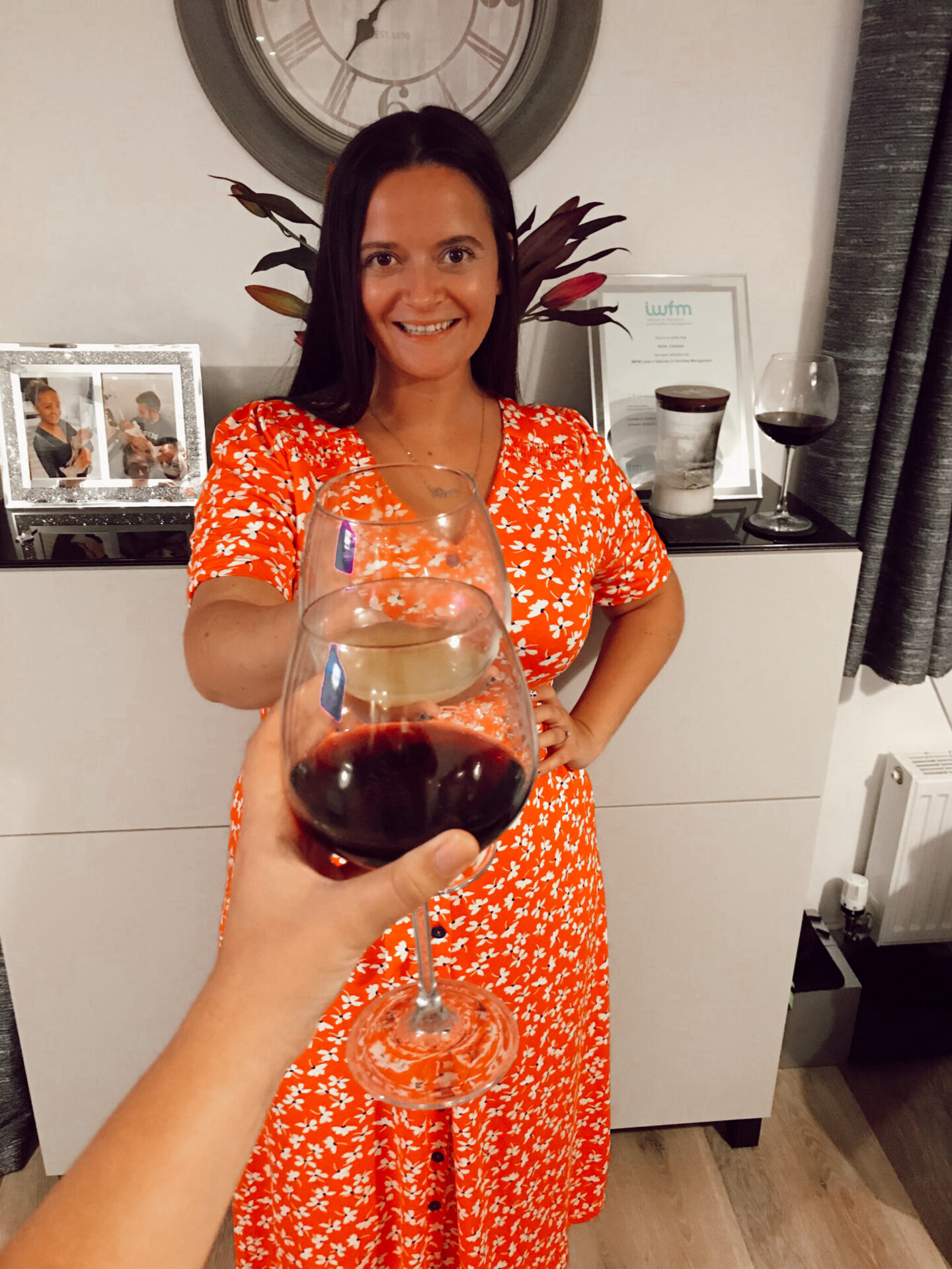 woman wears red dress
